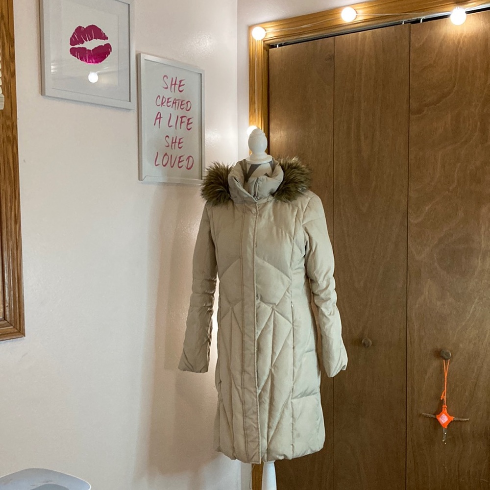 Beautiful Calvin Klein coat with fur hood. Gently worn.